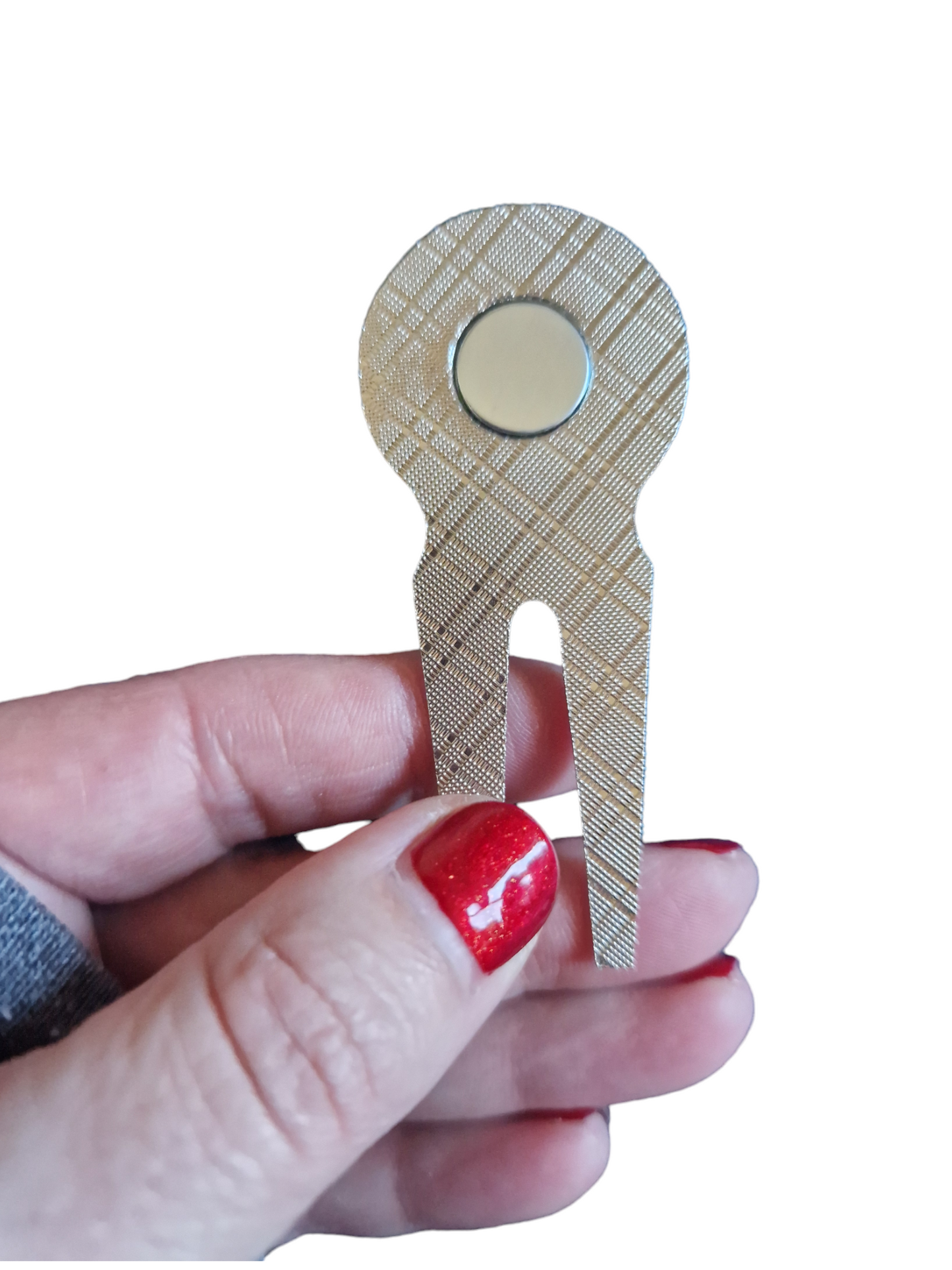 The back of the pitch repairer, showing the magnet