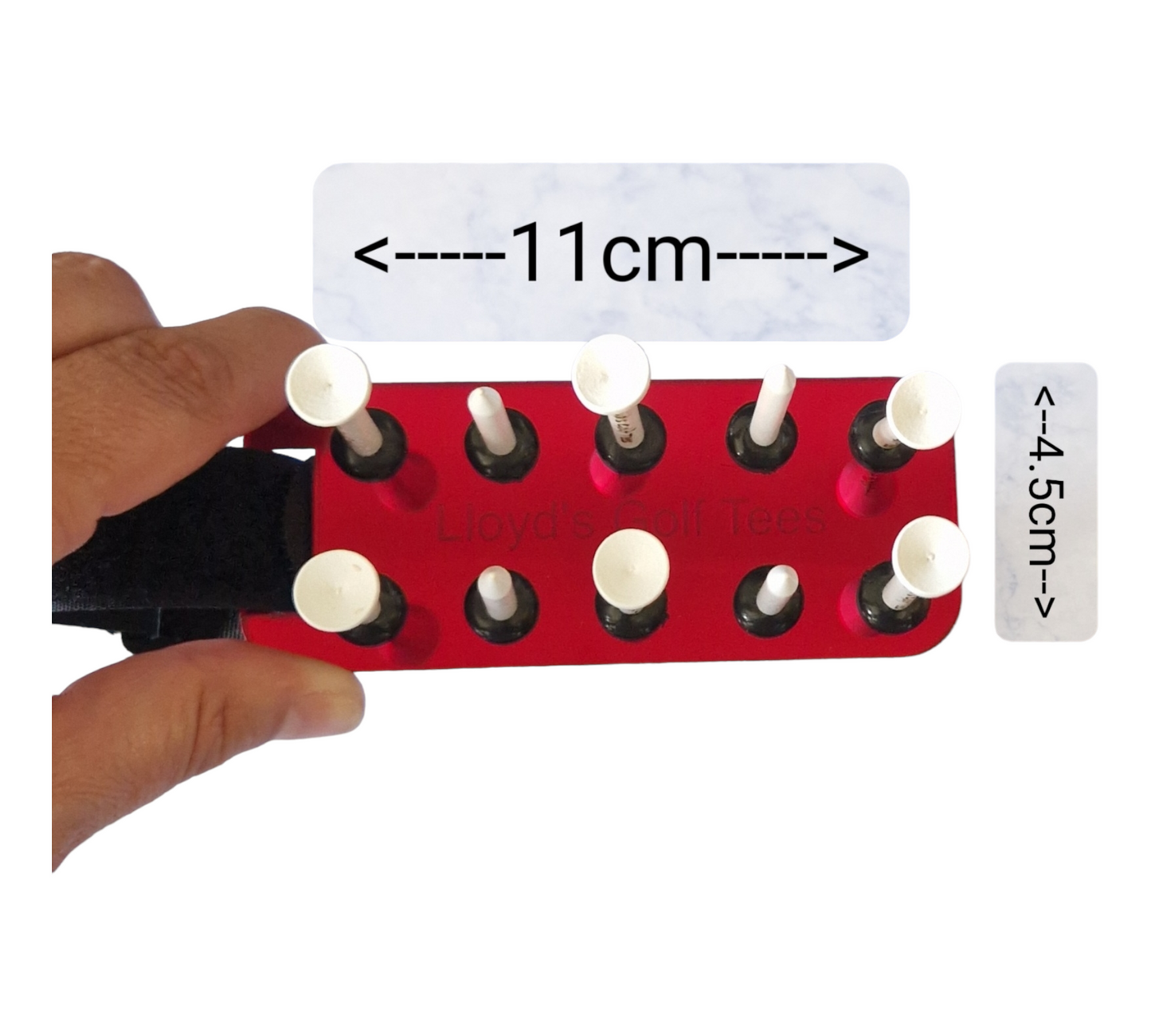 Image showing a different angle of the red golf tee holder. The holder is being held, the tees are placed inside the holder. The image also shows the dimensions of the holder excluding the strap (11x4.5cm)