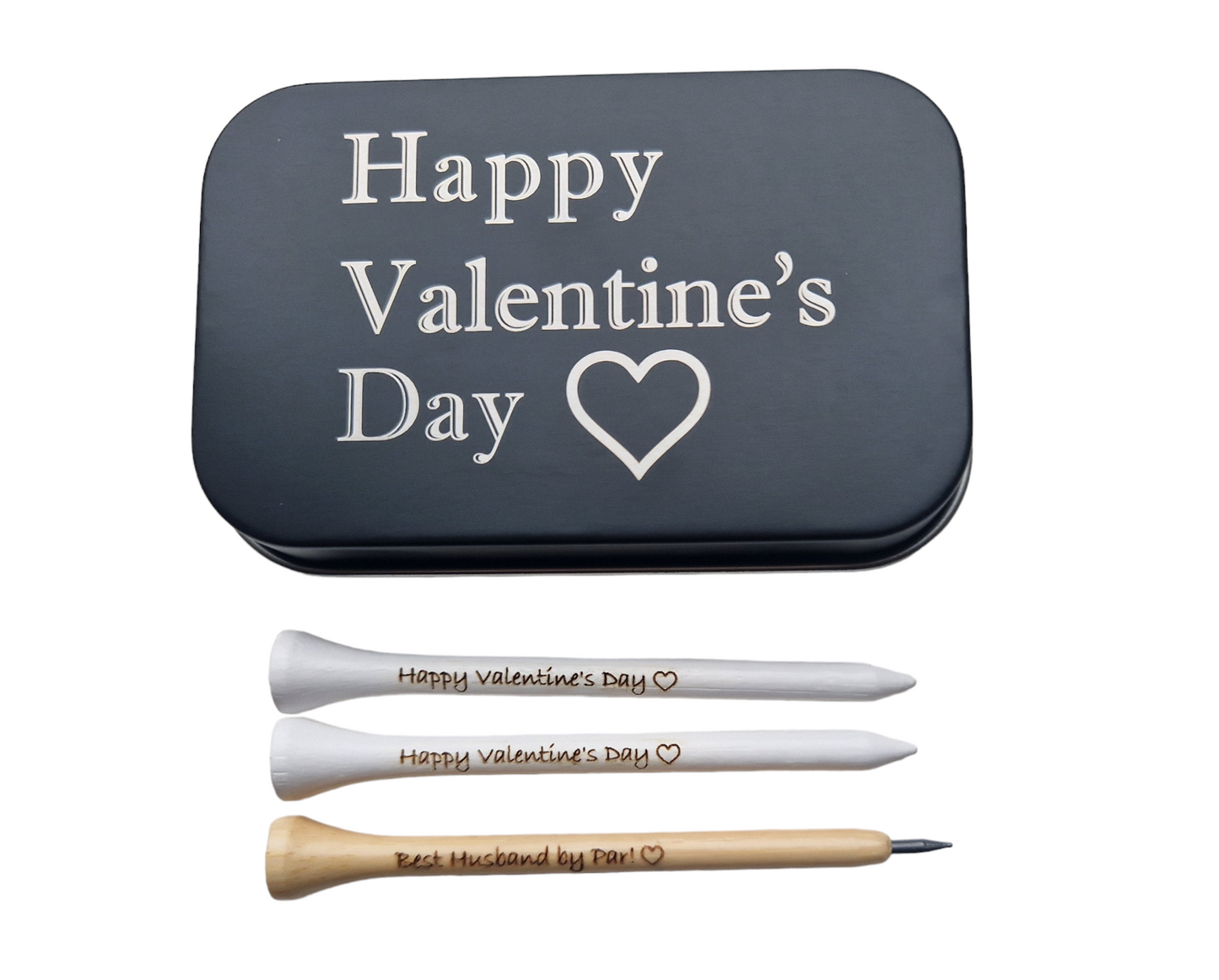 2x83mm white golf tees with the text "Happy Valentine's Day" and an outline of a heart laser engraved into them. 1 x novelty golf tee pencil with the text "Happy Valentine's Day" and an outline of a heart laser engraved into it. 
1 x black metal tin with "Happy Valentine's Day" and an outline of a heart laser engraved into it. 