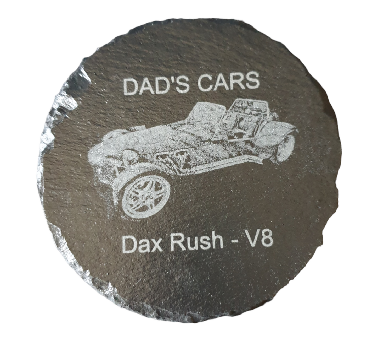 Slate personalised round coaster with the text "DAD'S CARS" at the top, "Dax Rush - V8" at the bottom and the image of a Dax Rush laser engraved into the middle of the coaster  